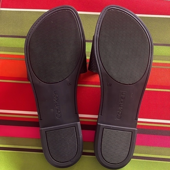 Brand New Calvin Klein Black Large Strap Sandals Flats w/ Gold Tone Metal Logo - Picture 9 of 12